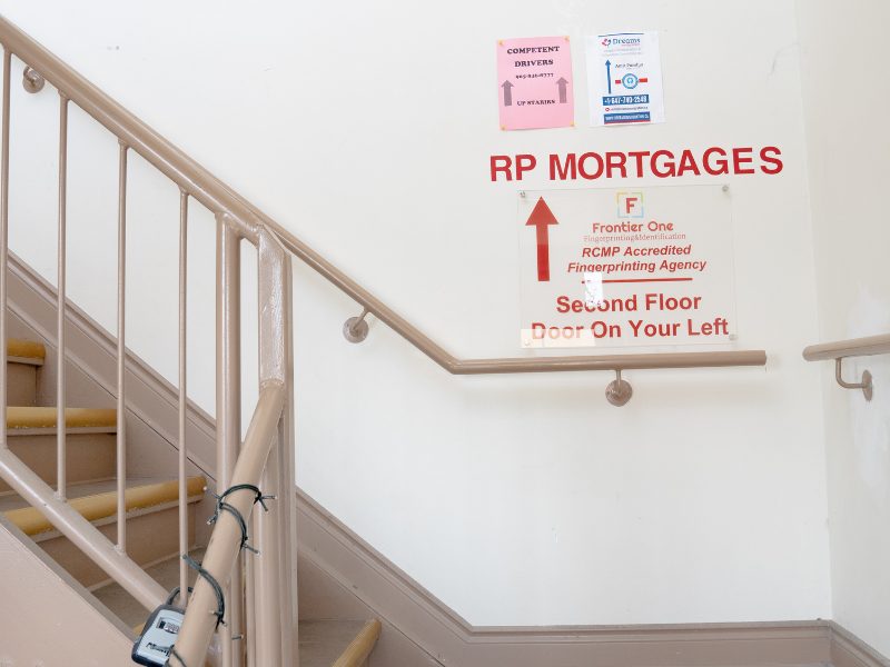 Brampton office: stairs to the second floor; the sign says the office door is on your left