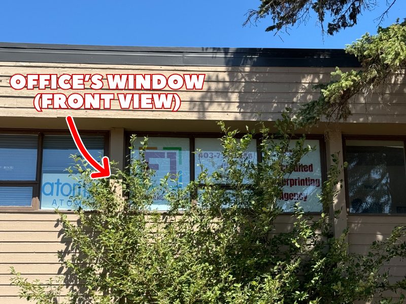Calgary SE office: the office window from the front, marked with an arrow