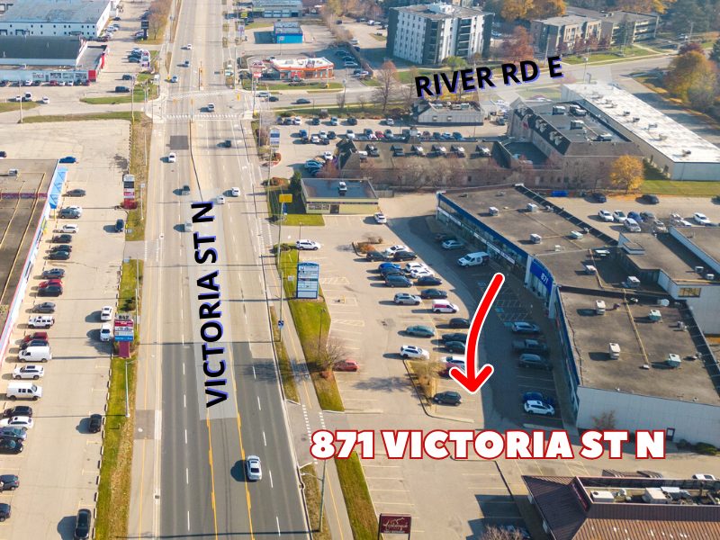 Kitchener office: aerial view of the building and its parking lot, with an arrow to the office