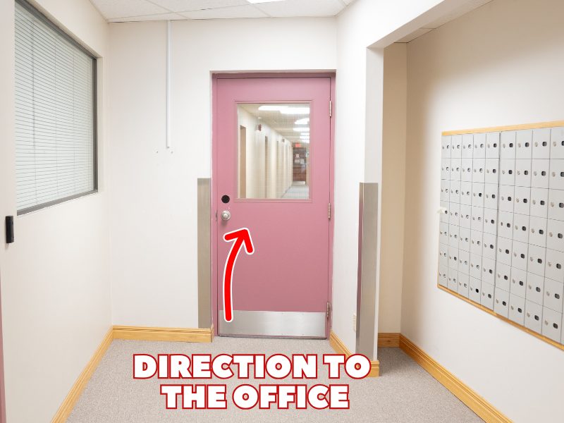 Kitchener office: the hallway, with an arrow toward the office