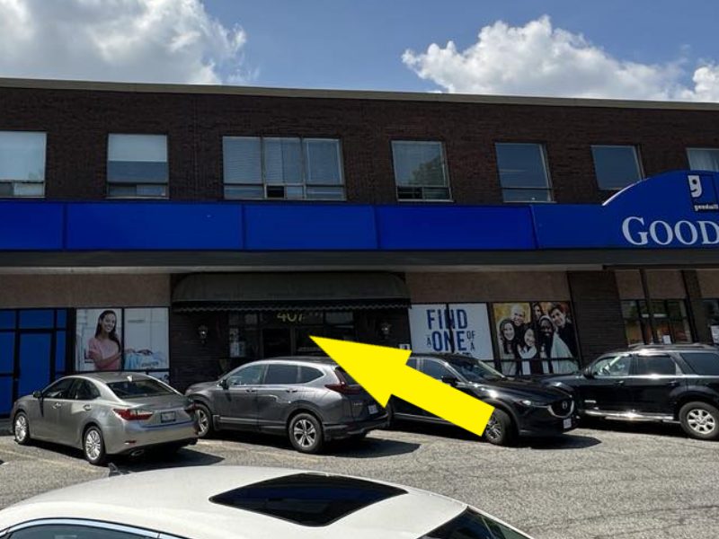 Oakville office: the office building at 407 Speers Rd, with an arrow to the entrance
